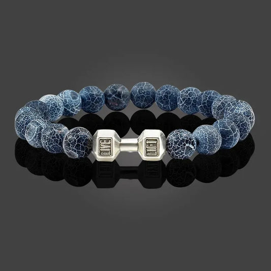 Pulsera de Piedra Volcánica con Dije de Mancuerna – Energía, Estilo y Fuerza Interior