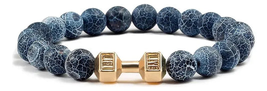 Pulsera de Piedra Volcánica con Dije de Mancuerna – Energía, Estilo y Fuerza Interior